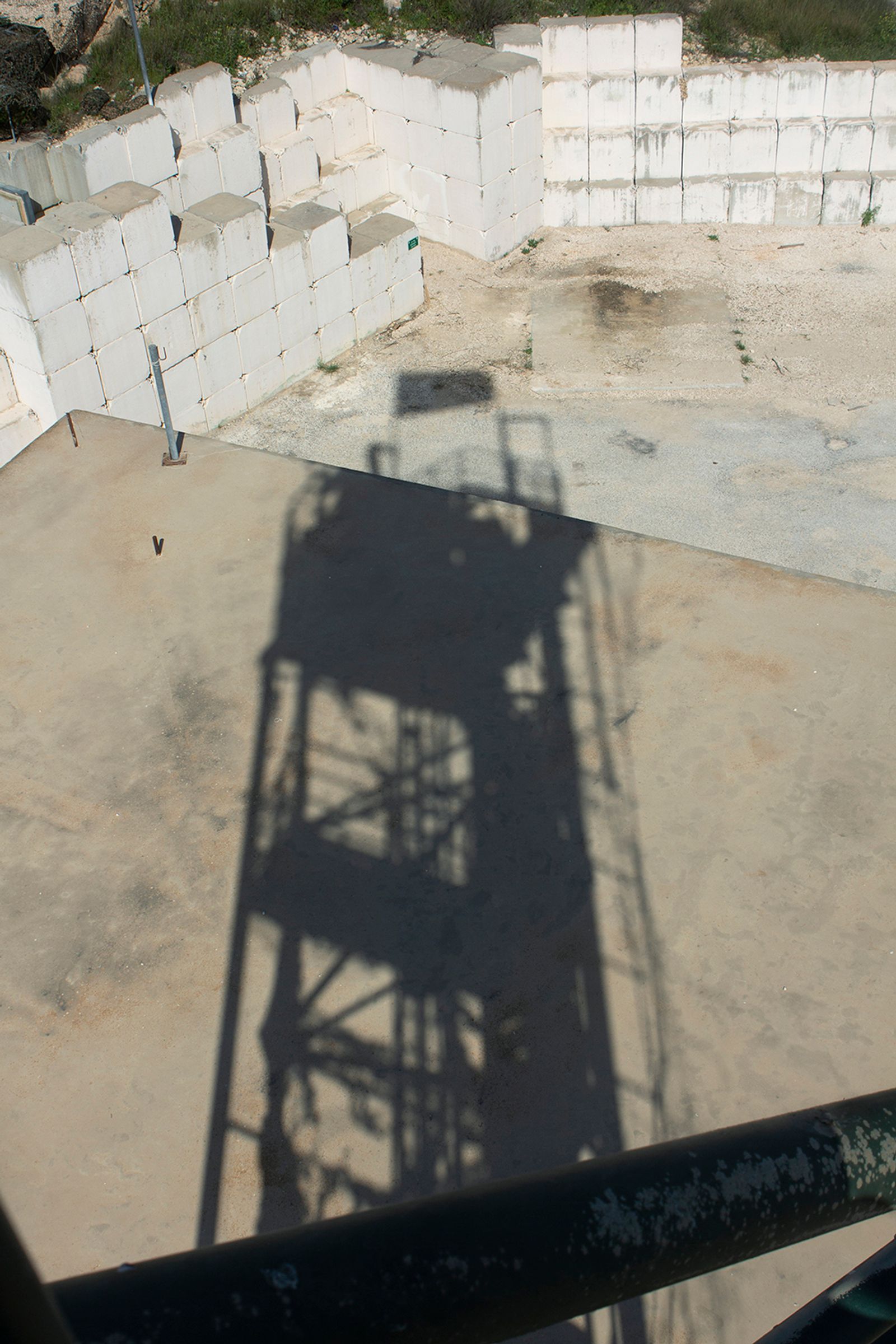 © Ekaterina Bodyagina - The shadow of a sight tower at the aban-doned military outpost in the North of Israel, close to the border with Lebanon