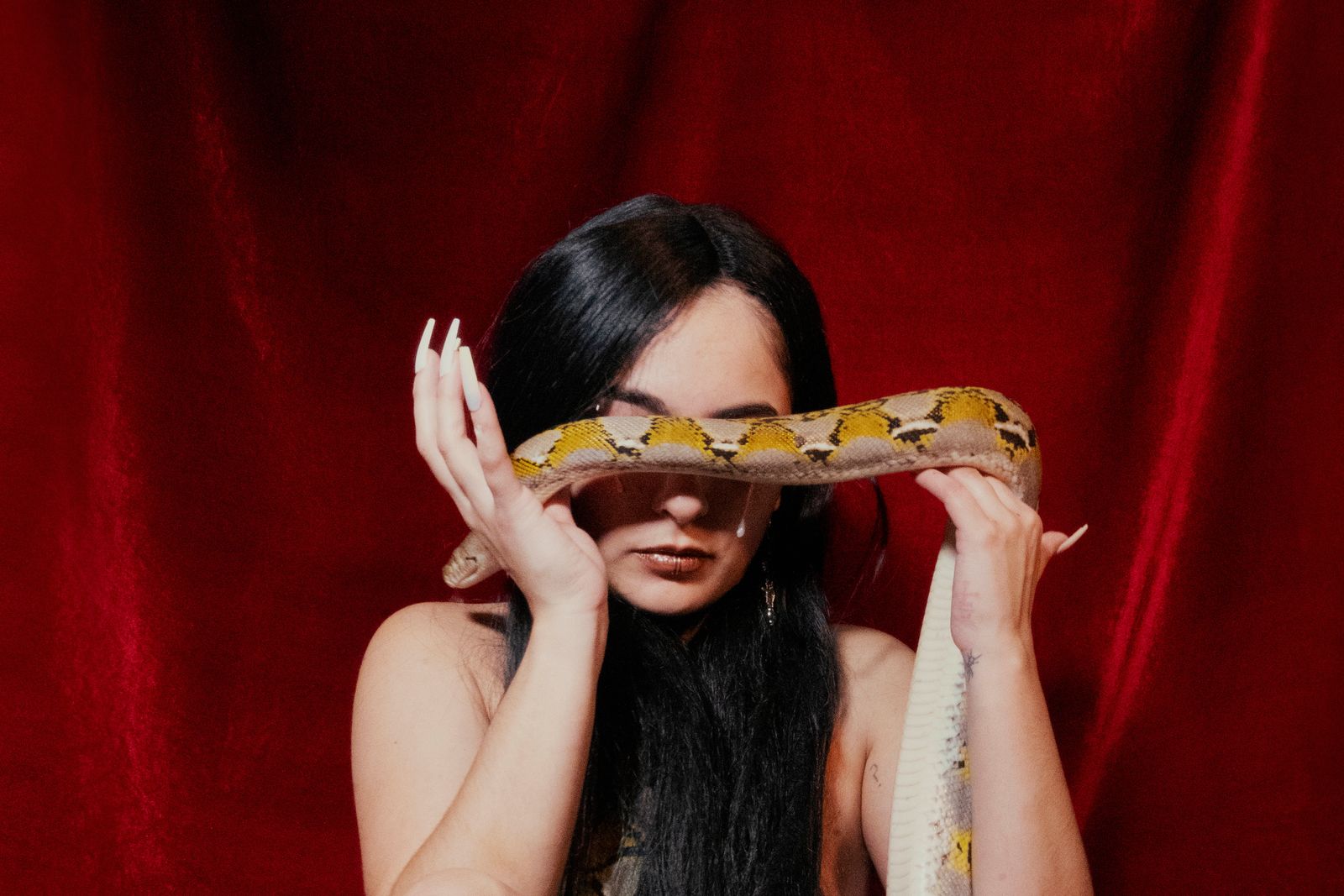 © Alberto Lara - See no Evil.  Model Andrea Gonzales and Jafar the serpent.