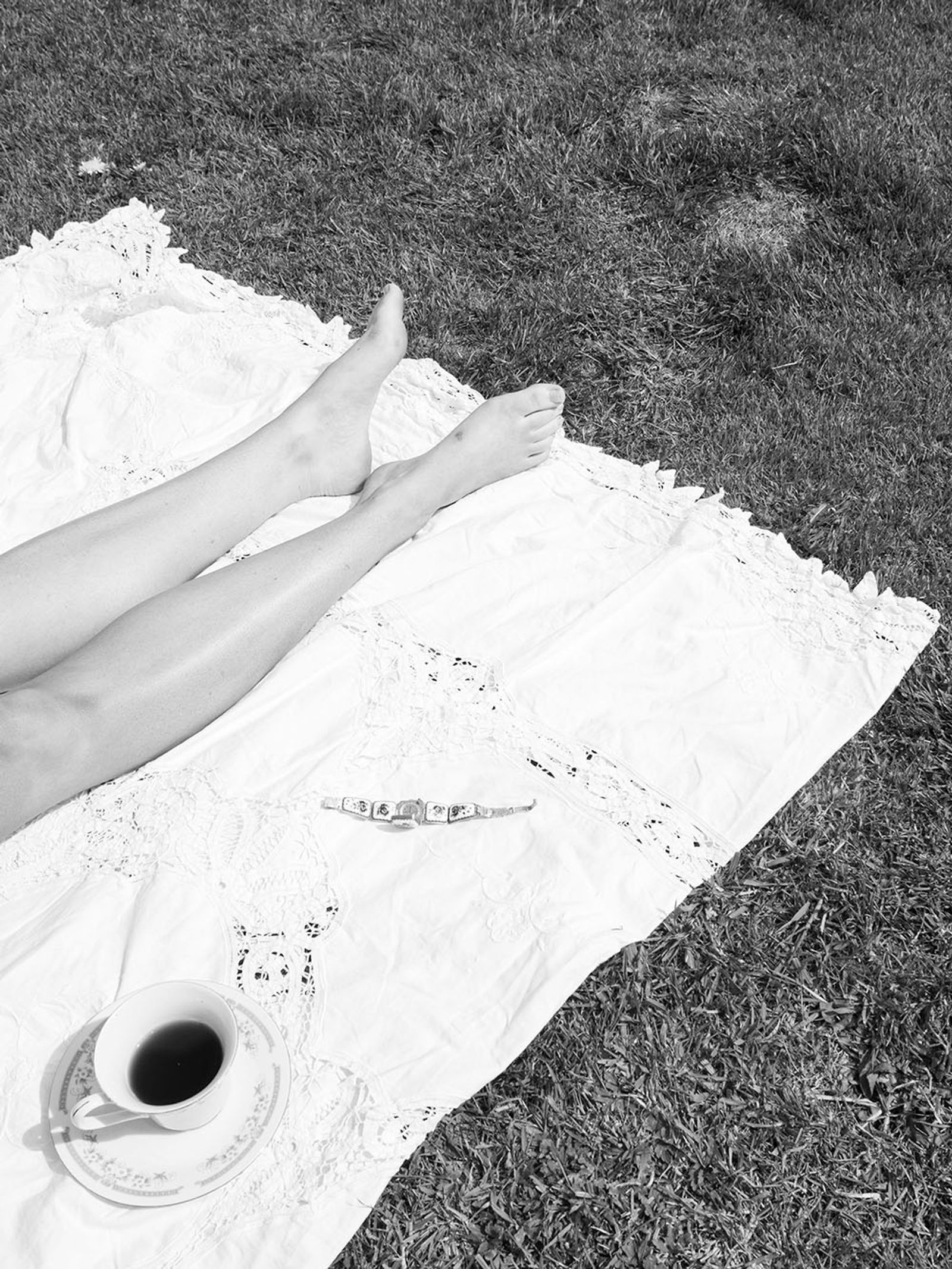 © Chloe Alexandra Davies - Sunbathing with coffee.