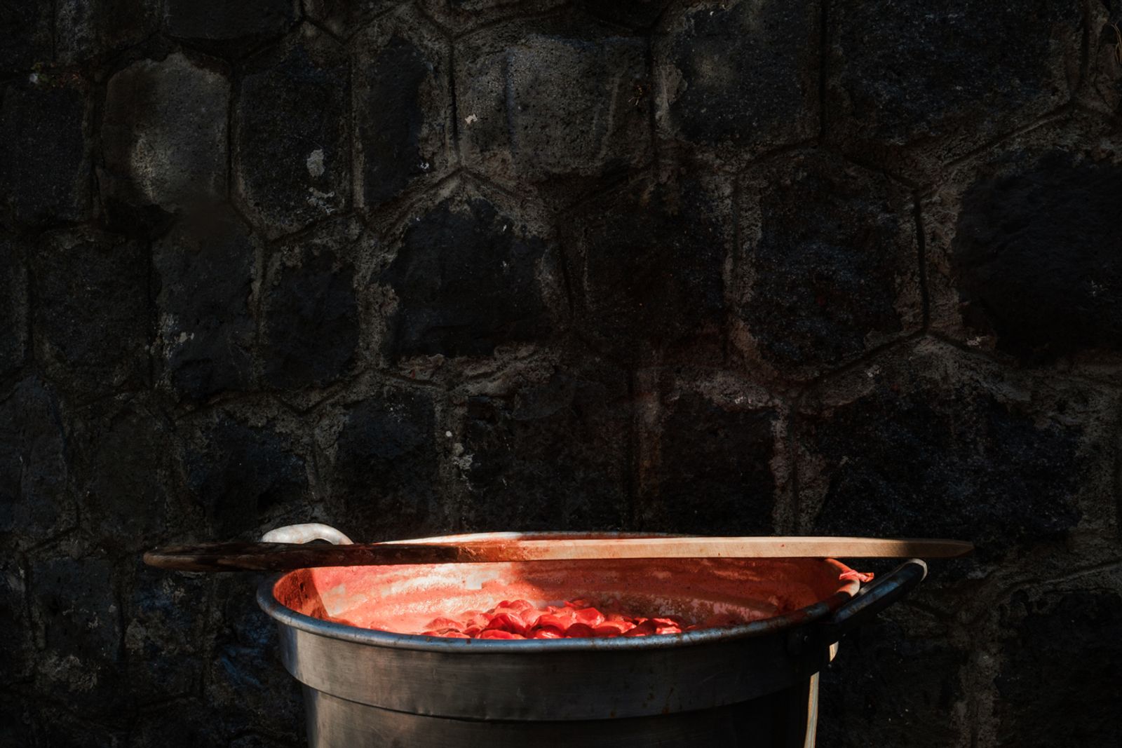© Claire Power - A cauldron for boiling tomatoes. Every summer around August families get together for a few full days to make passata