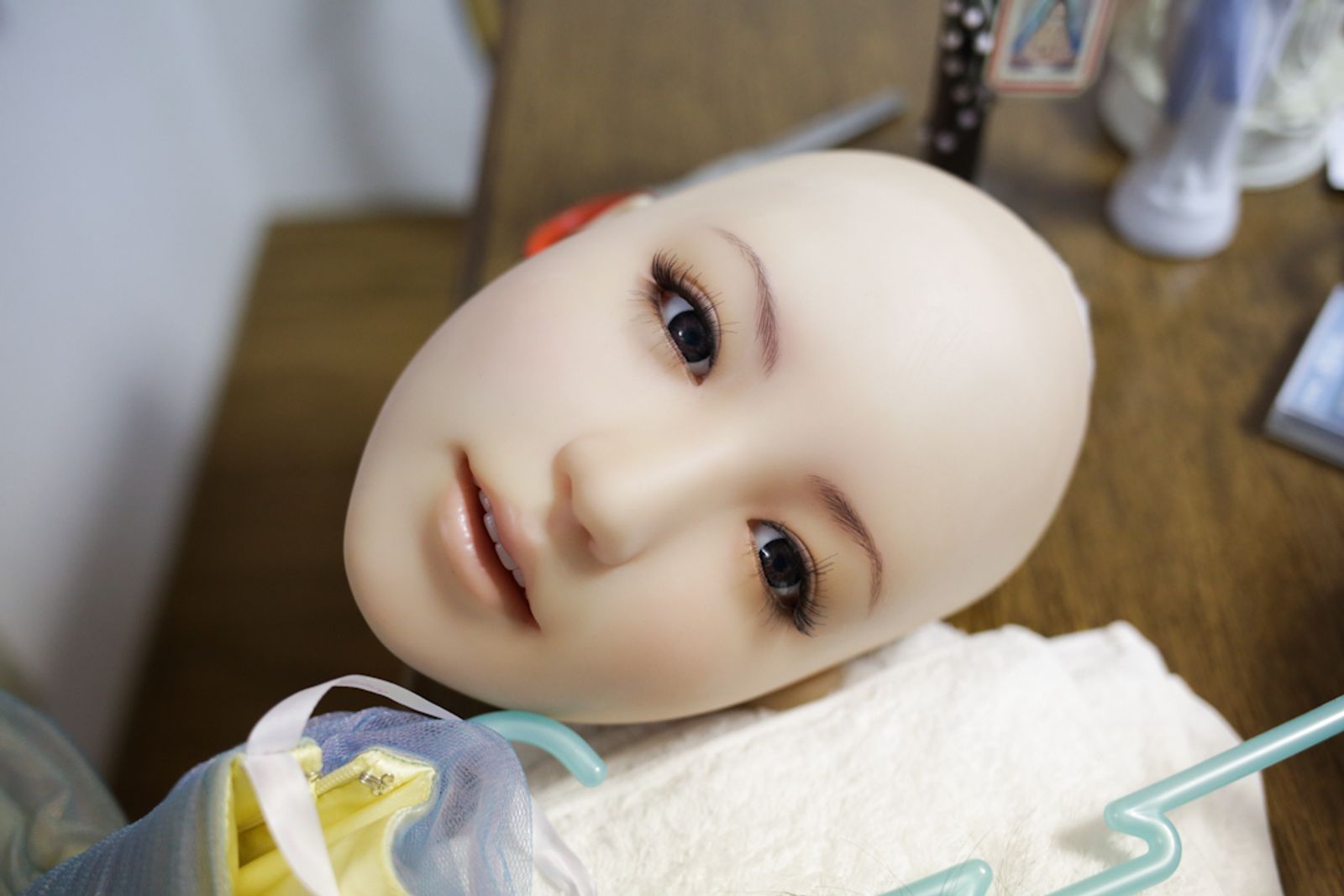 © Taro Karibe - The head of Love Doll 'Saori' at its owner Senji Nakajima's apartment on June 25, 2016 in Tokyo, Japan.