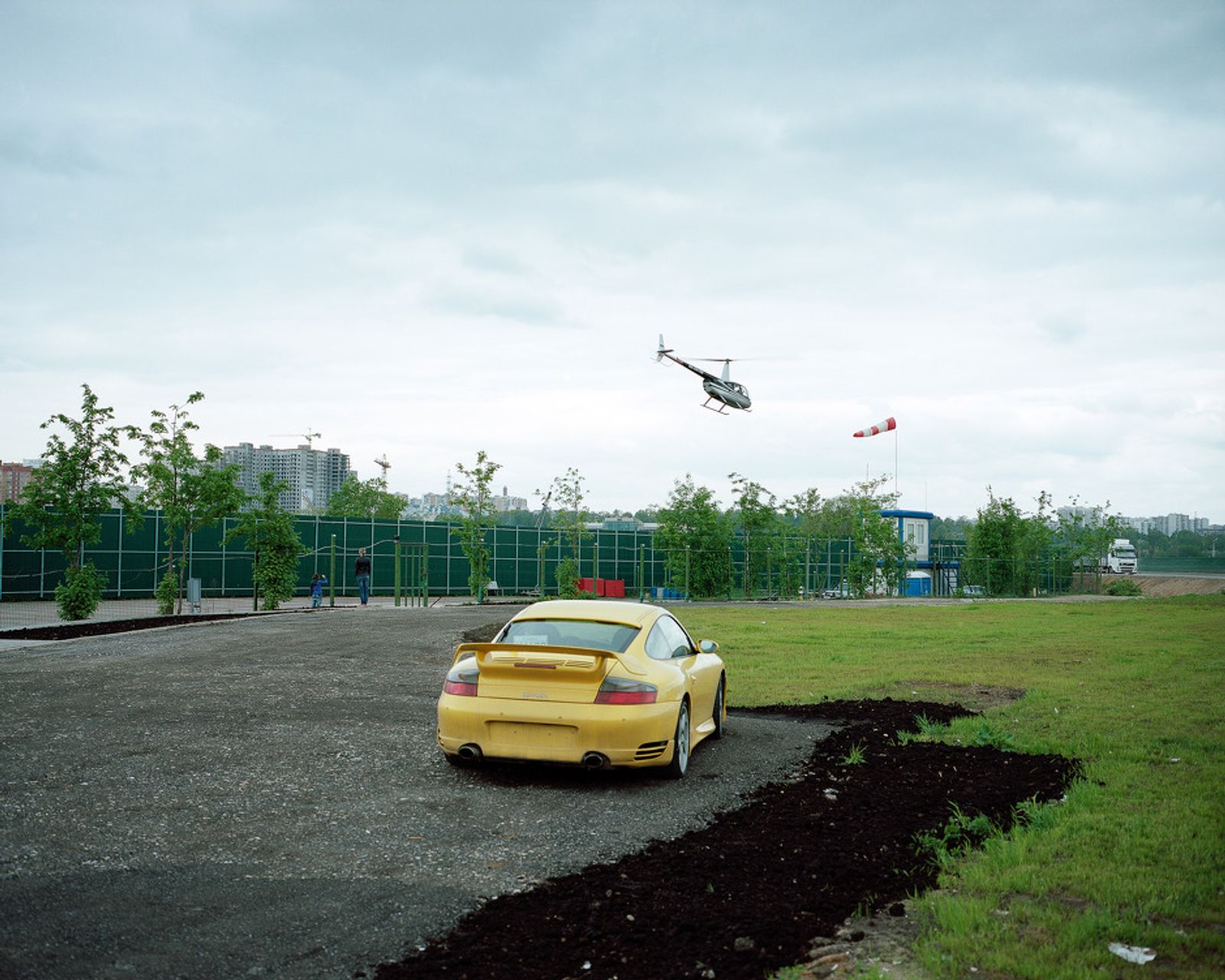 © Petr Antonov - Image from the Trees, cars, figures of people, assorted barriers photography project