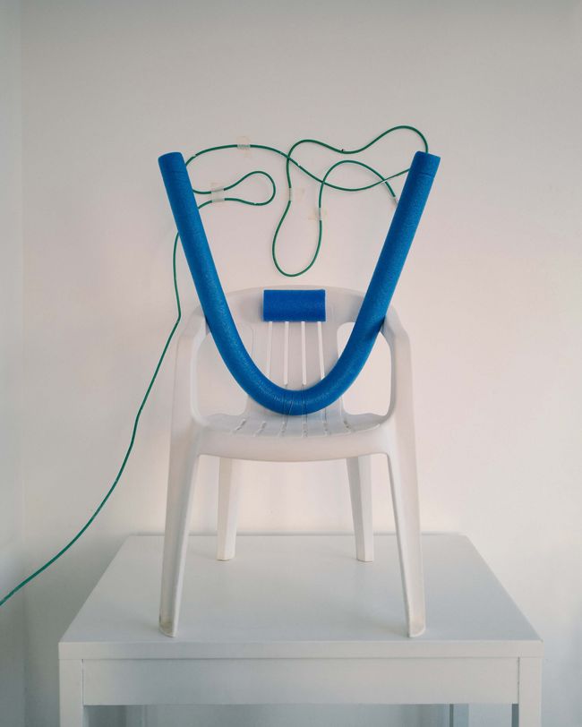 © Nikita Lukyanov - a face / installation with plastic pool noodle and tv cable